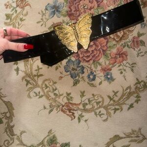 Elegant Black Belt with Gold Butterfly Accent